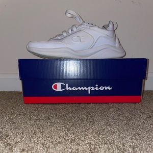 Champion® Next Emboss Women's
Sneakers